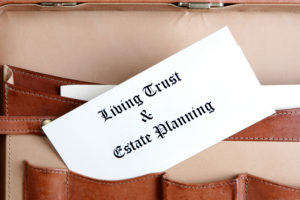 Estate planning documents in a leather briefcase revocable living trust