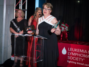 Mary Cushing Doherty receiving her award for LLS woman of the year in PA