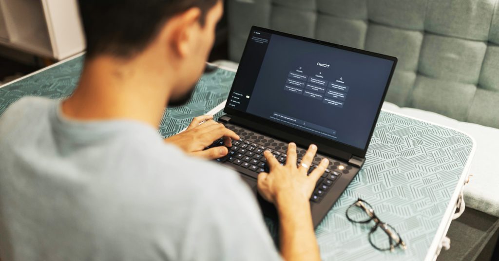 man using chatgpt at home for work purposes
