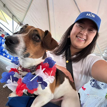 Emily Bushnell and her dog at the Doylestown memorial day parade picnic at High Swartz LLP